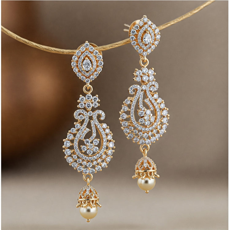 Pair of elegant Feelori CZ hanging earrings with sparkling cubic zirconia stones in rhodium plate - contemporary Indian jewelry.