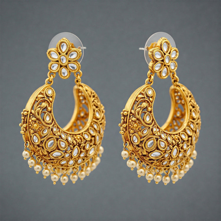Luxurious Feelori Jadau Kundan Bali Hoop earrings with uncut polki stones set in intricate gold plate - traditional Indian jewelry.