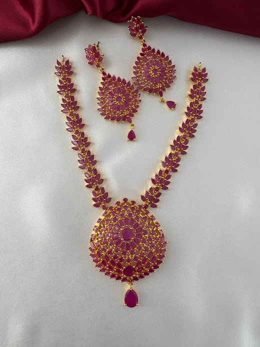 FeelOri Gold Plated Ruby Leaf Mandala Necklace Set - Full front view showcasing the grand central pendant and matching earrings.