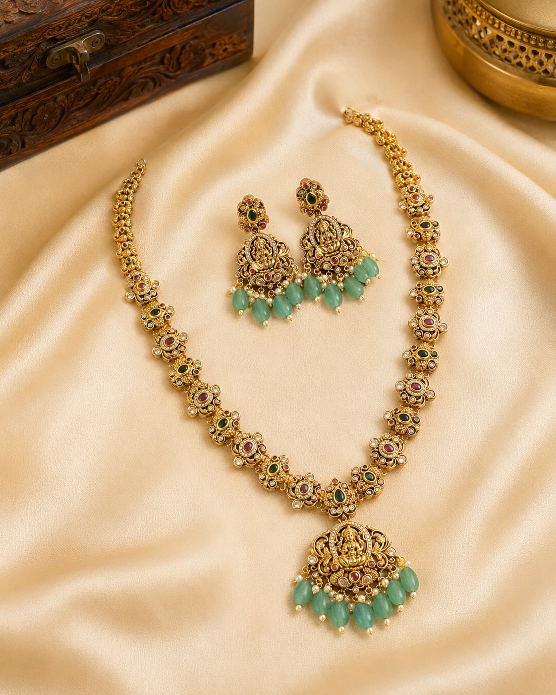 FeelOri emerald-tone necklace set with matching earrings pendant and gold-polished detail