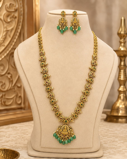 FeelOri Emerald Lakshmi Pendant Necklace Set for Pattu Sarees with matching earrings, front view