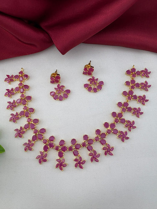FeelOri Antique Finish Ruby-Tone CZ Short Necklace Set with matching earrings - Collector's Item. Full view of the ruby floral design necklace and earring pair.