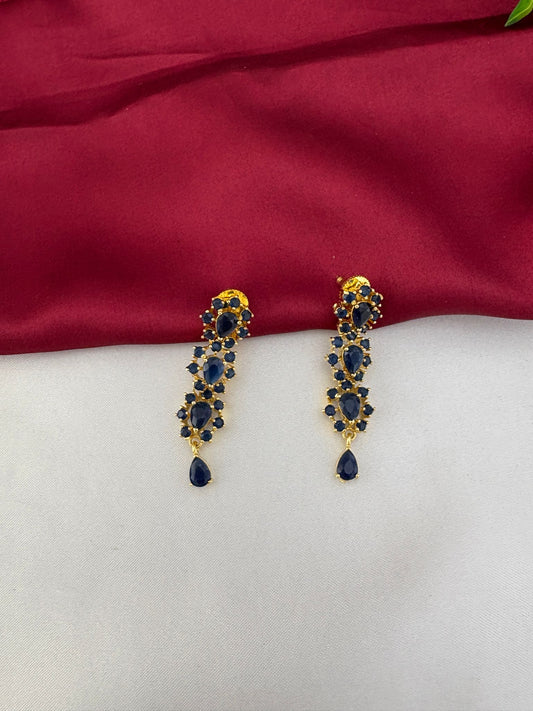 Detailed close-up of the FeelOri Azure Aura Sapphire-Blue & AD Halo Earrings, showcasing the intricate design with sapphire-blue and AD stones by feelori.