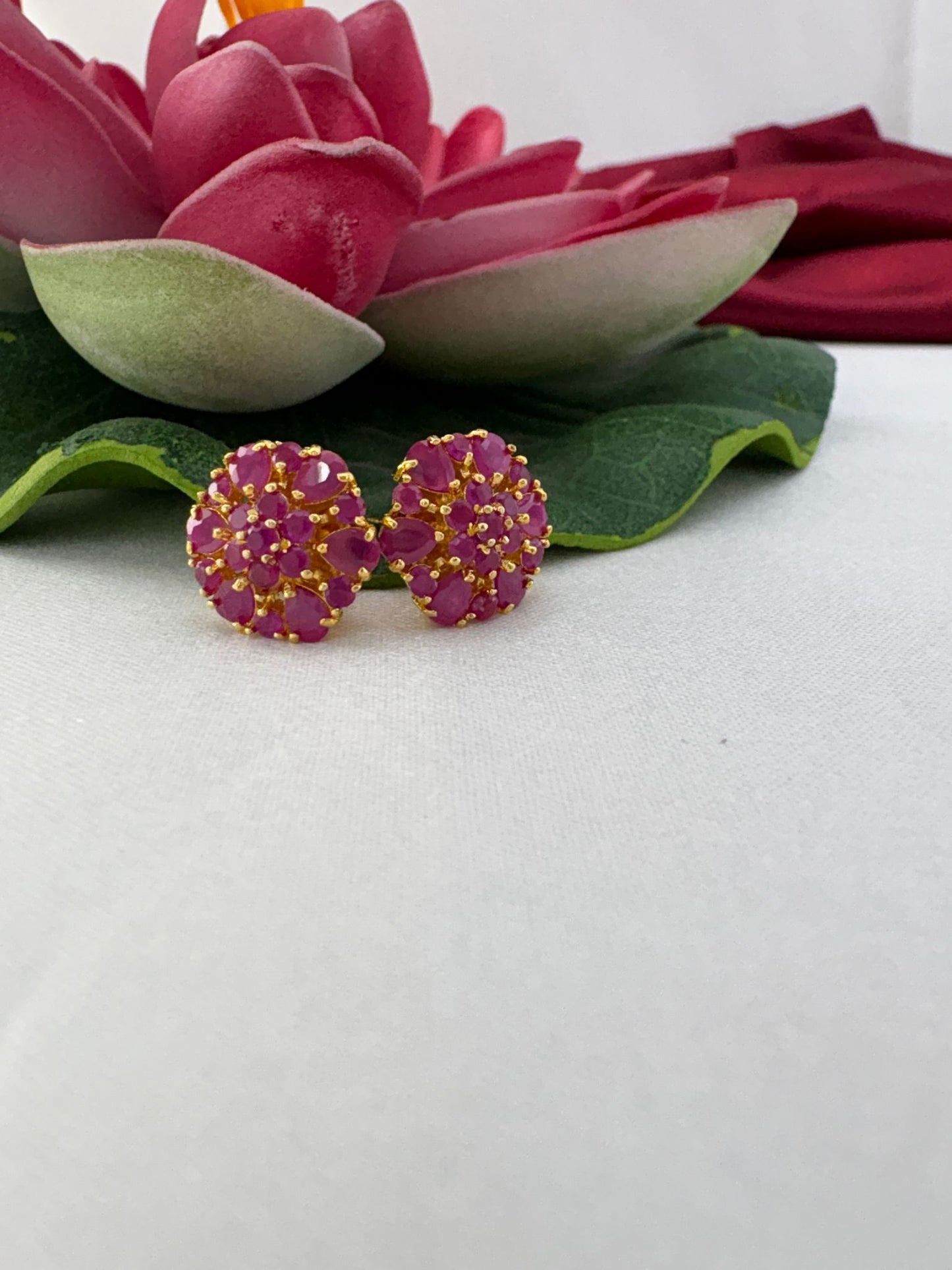 FeelOri berry sorbet cool pink AD studs styled with lotus creating refreshing summer dessert-inspired appeal