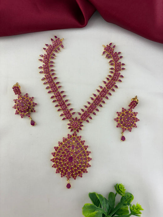 FeelOri Bold Statement Ruby-Tone CZ Short Necklace Set with matching earrings elegantly displayed.