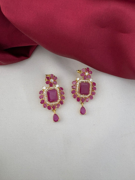Detailed close-up of ruby and AD earrings from the FeelOri Cascade Necklace Set. Chennai Elegance by feelori.
