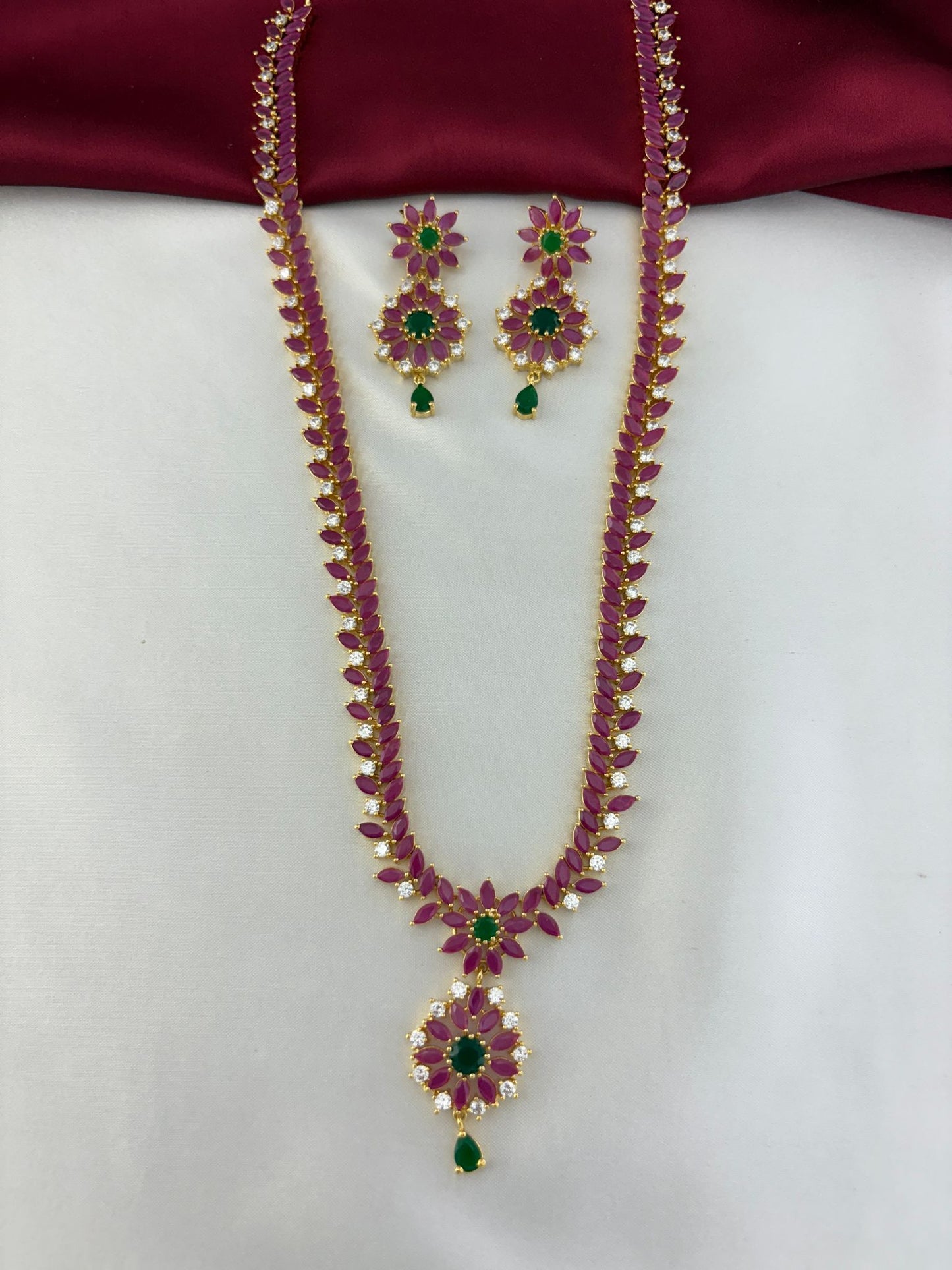 Feelori Celestial Cascade Rainbow AD Long Necklace and Earring Set - Main product image showing the full set with ruby, emerald, and white AD stones.