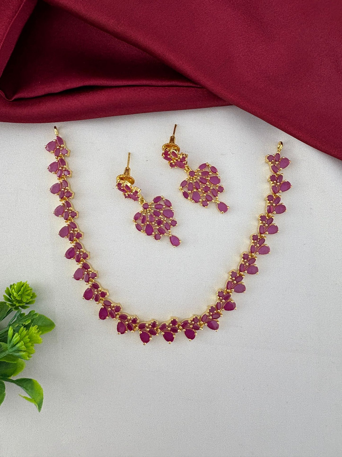 Styled view of the FeelOri Classic Original Ruby Short Necklace Set. Elegant design by feelori.