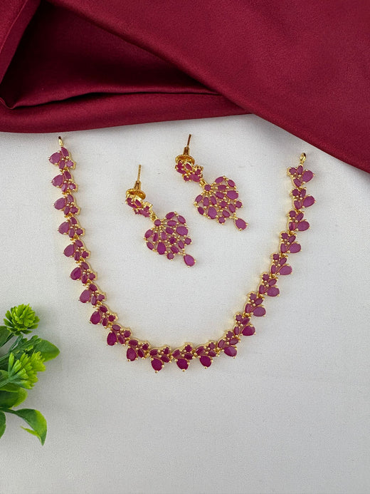 Styled view of the FeelOri Classic Ruby-Tone CZ Short Necklace Set. Elegant design by feelori.