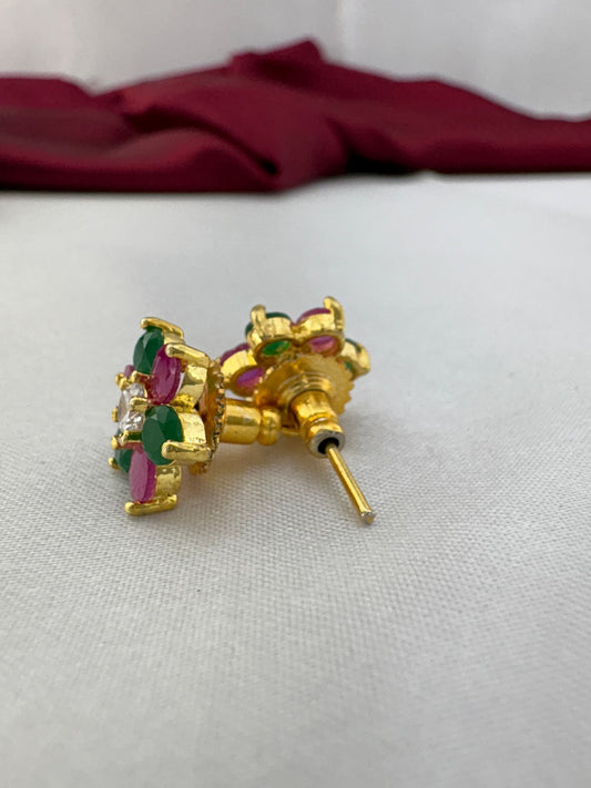 FeelOri Confetti Pop multi-color AD stud earrings angled view displaying gold post construction and back mechanism