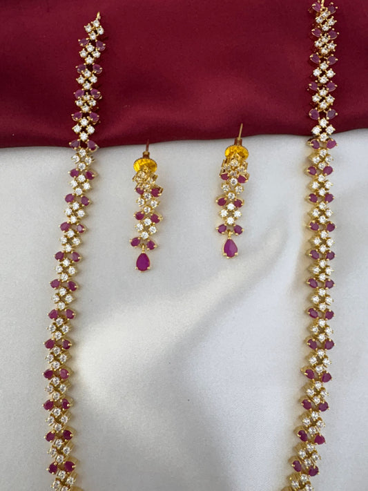 Detailed close-up of the FeelOri Crimson Sparkle Weave Ruby & AD Long Necklace and Earrings, highlighting the stone work and pattern.