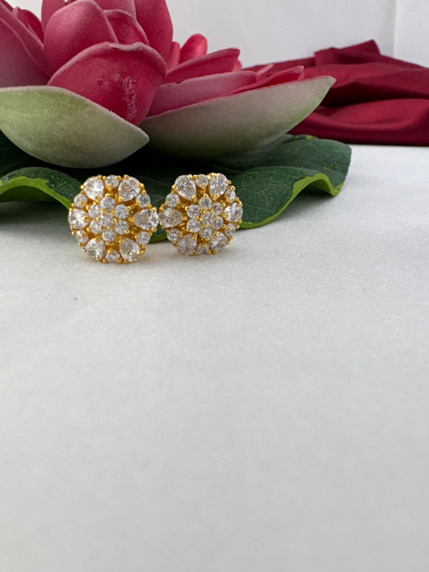 FeelOri crystal clear white brilliant AD tops styled with lotus showcasing maximum sparkle and brilliance