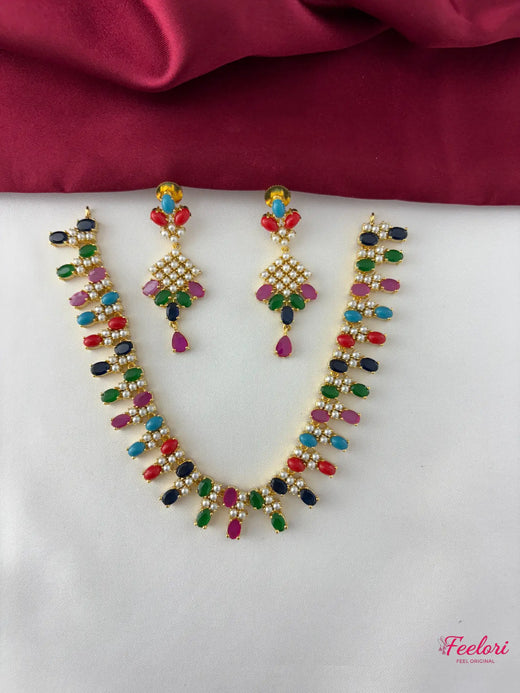 FeelOri Gold Plated Multicolor Gemstone Necklace Set - Front view showcasing the full set with vibrant leaf-like stone patterns and tear-drop earrings.