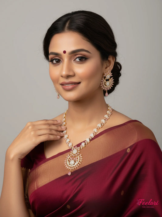 FeelOri Gold Plated Petal AD Necklace Set - Model wearing elegant set with traditional saree, smiling at camera