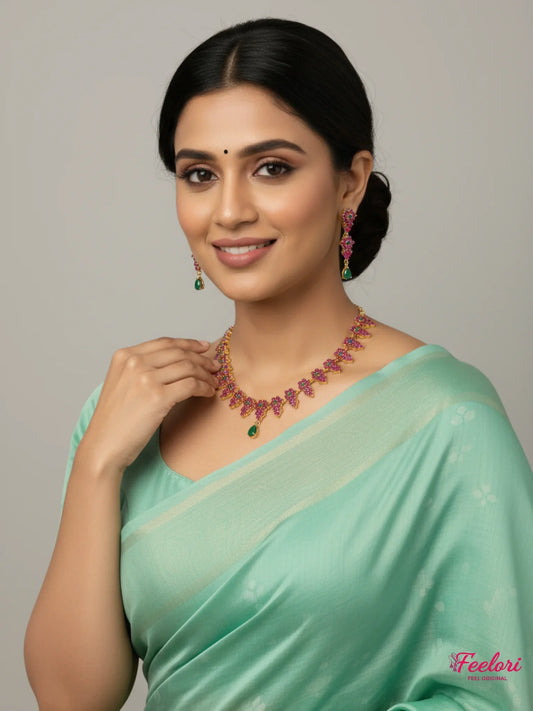 FeelOri Gold Plated Ruby Emerald Vine Necklace Set - Model in green saree wearing delicate set.