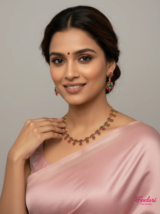 FeelOri Gold Plated Ruby Emerald Vine Necklace Set - Model wearing trellis set with elegant pink saree.