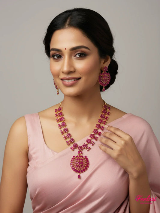 FeelOri Gold Plated Ruby Necklace Set - Model wearing floral set with traditional saree, festive smile.