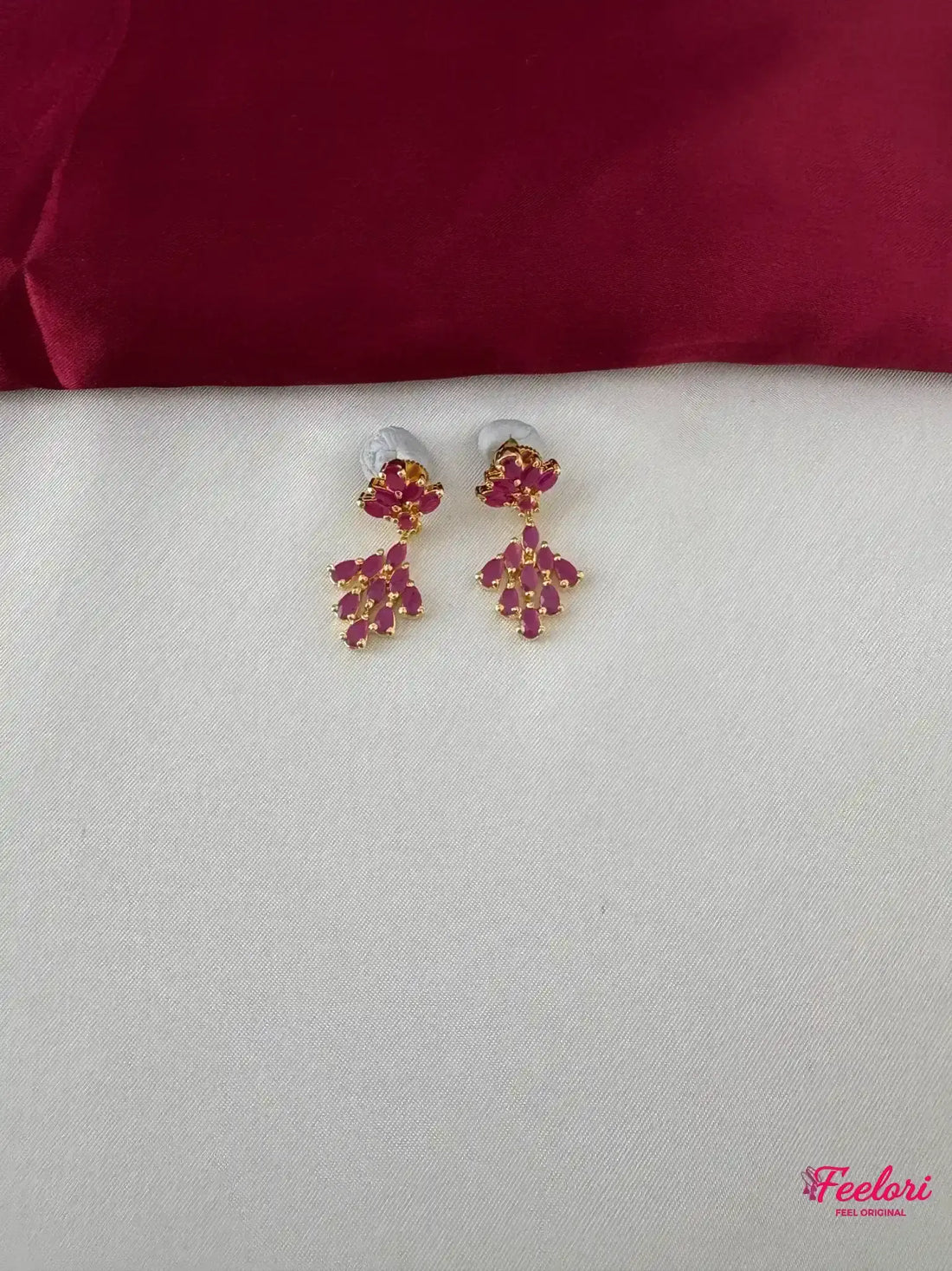 FeelOri Gold Plated Ruby Petal Earrings - Close-up view highlighting the intricate petal arrangement of Ruby-Tone CZ stones on the earrings.