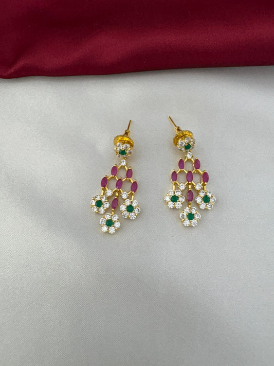 Close-up of the matching earrings from the FeelOri Jewel Tone Majesty Multi-Color AD Necklace Set, showing ruby, emerald, and clear stone details.