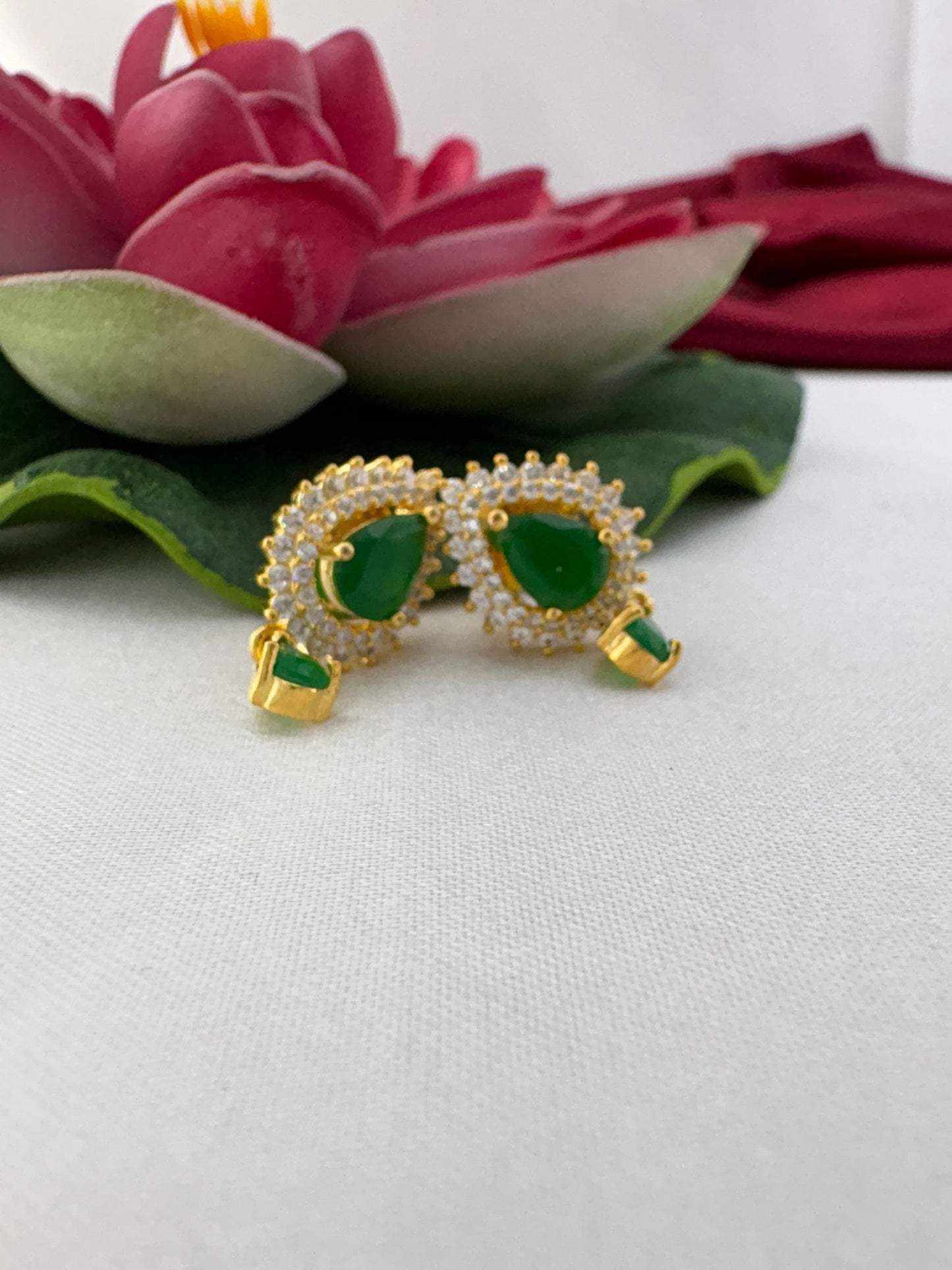 FeelOri light green AD stud earrings styled with pink lotus creating fresh spring-like color harmony