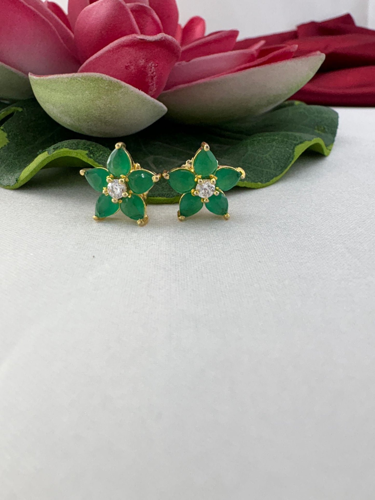 FeelOri medium green meadow AD stud earrings styled with lotus emphasizing fresh natural outdoor appeal