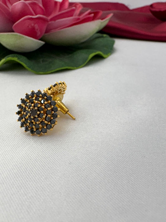 FeelOri Midnight Glam black AD stud earrings side angle view showing gold post and secure back mechanism