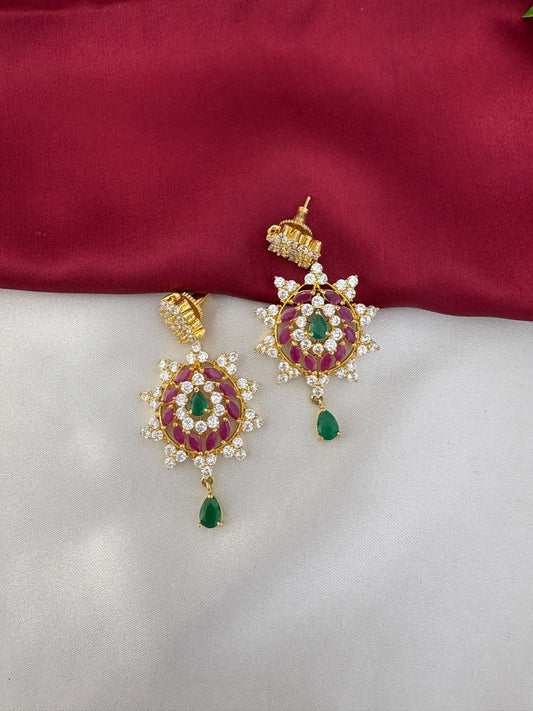 Feelori Monochrome Éclat Multi Color AD Earrings - Detailed close-up of the matching star-shaped earrings with red, green, and white American Diamond stones.