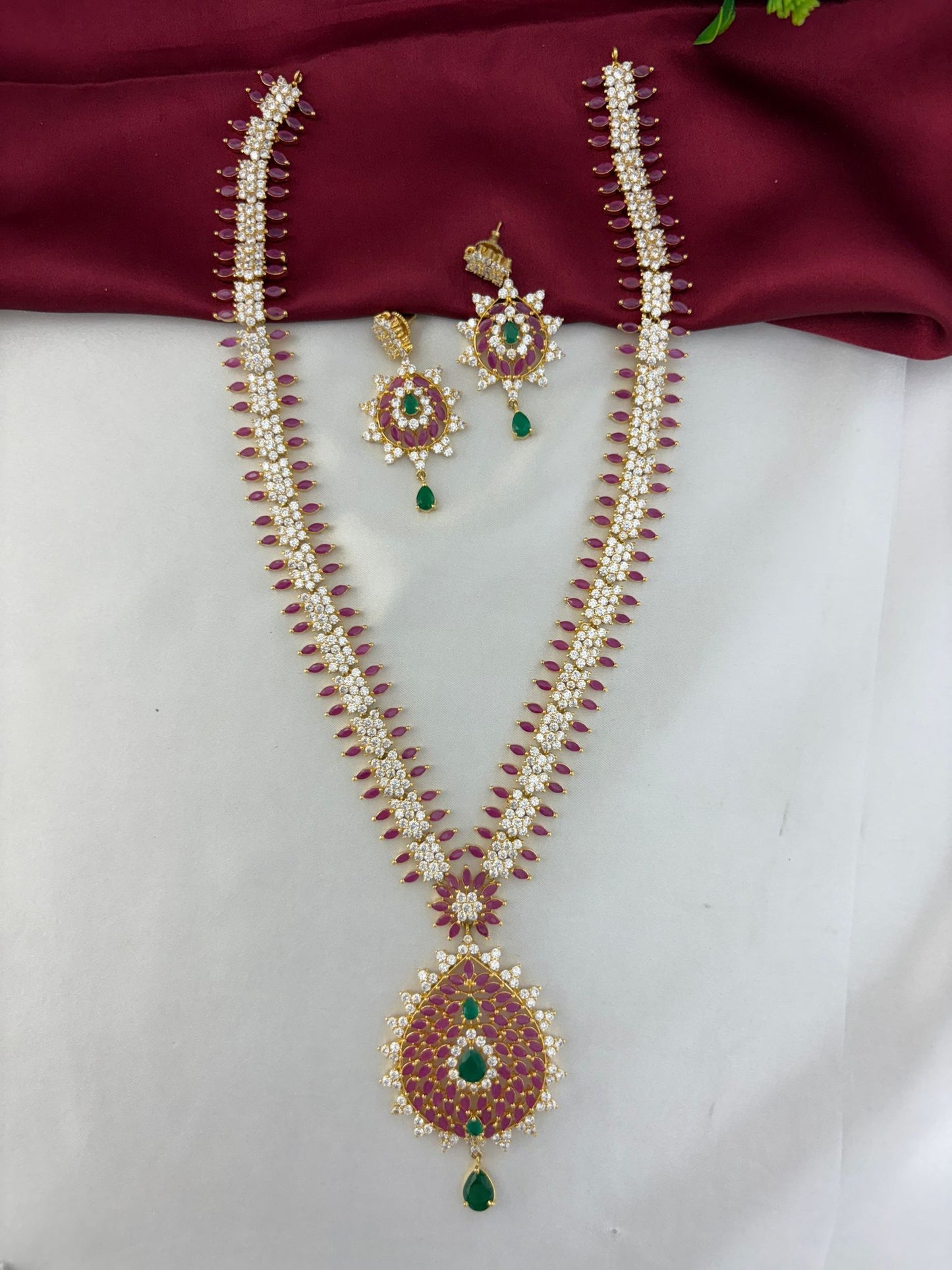 Feelori Monochrome Éclat Multi Color AD Long Necklace and Earring Set - Angled view highlighting the haram style design and pendant detail.