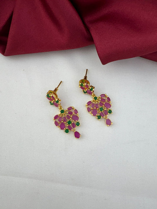 Detailed close-up of the FeelOri Mysore Vasantham ruby and emerald stone earrings, highlighting the design.