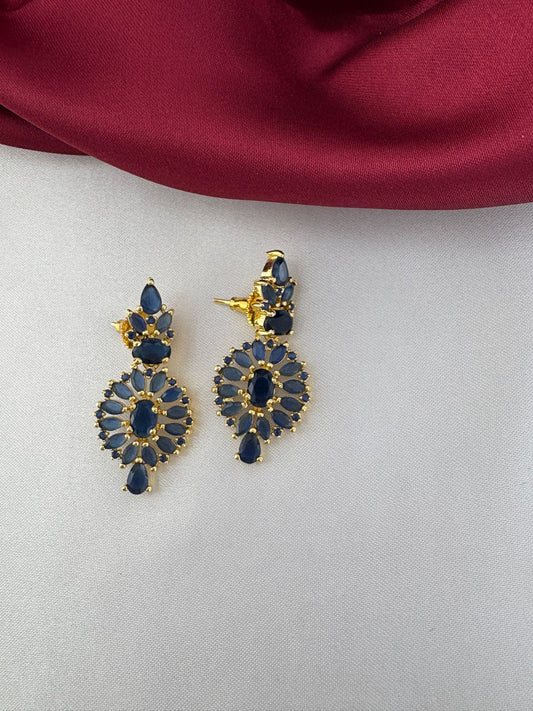 Close-up of FeelOri Oceanic Serenity blue AD cluster earrings, part of the short necklace set.
