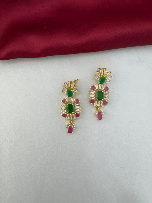 Close-up of FeelOri Pastel Dreams Multi-Color AD earrings showcasing the emerald and ruby colored stones.