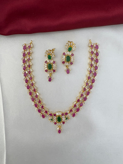FeelOri Pastel Dreams Multi-Color AD Short Necklace Set with earrings, displayed on fabric.