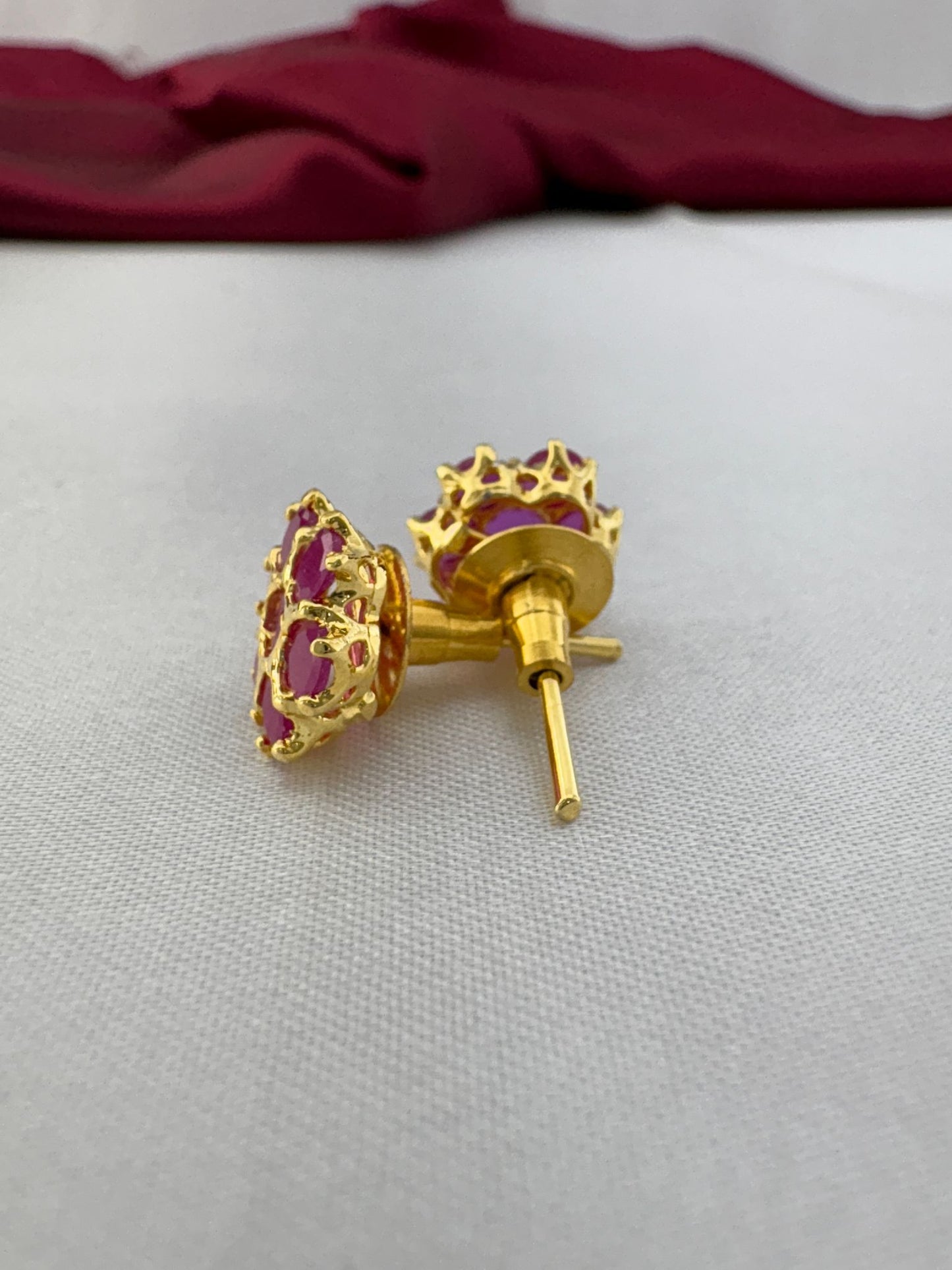 FeelOri Peony Pink soft mid-tone AD stud earrings angled view displaying gold post mechanism and secure back