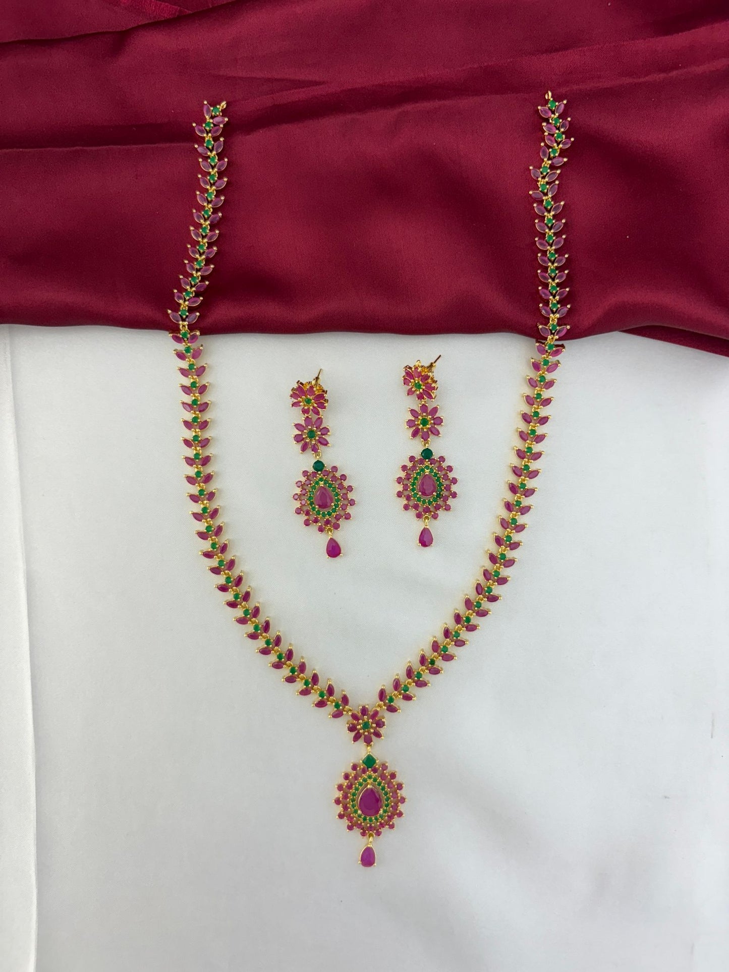 FeelOri Royal Garden Ruby & Emerald Floral Long Necklace & Earring Set - main view showing necklace and earrings.