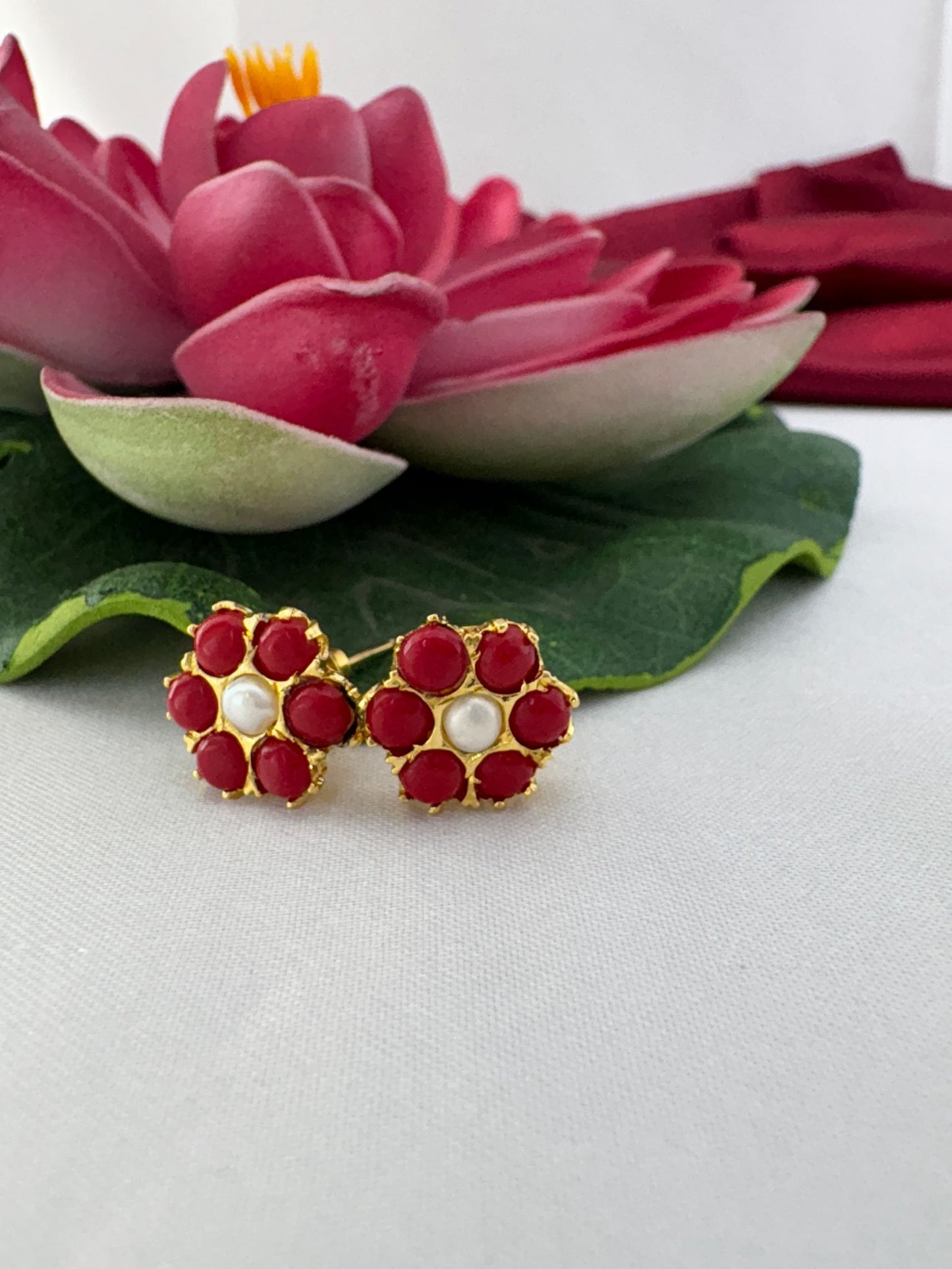 FeelOri passionate ruby hue AD studs styled with lotus creating romantic fiery passionate love-inspired appeal