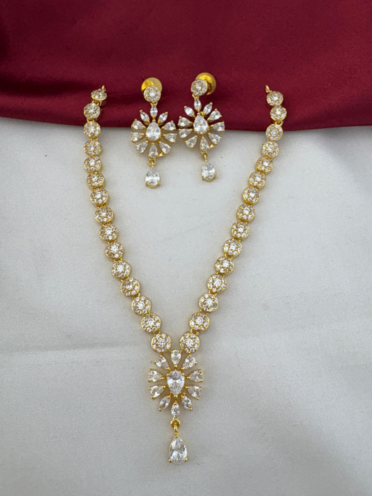 FeelOri South Indian Glow AD Stone Temple-Inspired Short Set - Elegant flat lay on white and maroon fabric