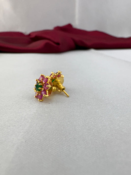 FeelOri Tea Rose Pink Olive Green AD tops angled view displaying gold post mechanism and premium back fitting