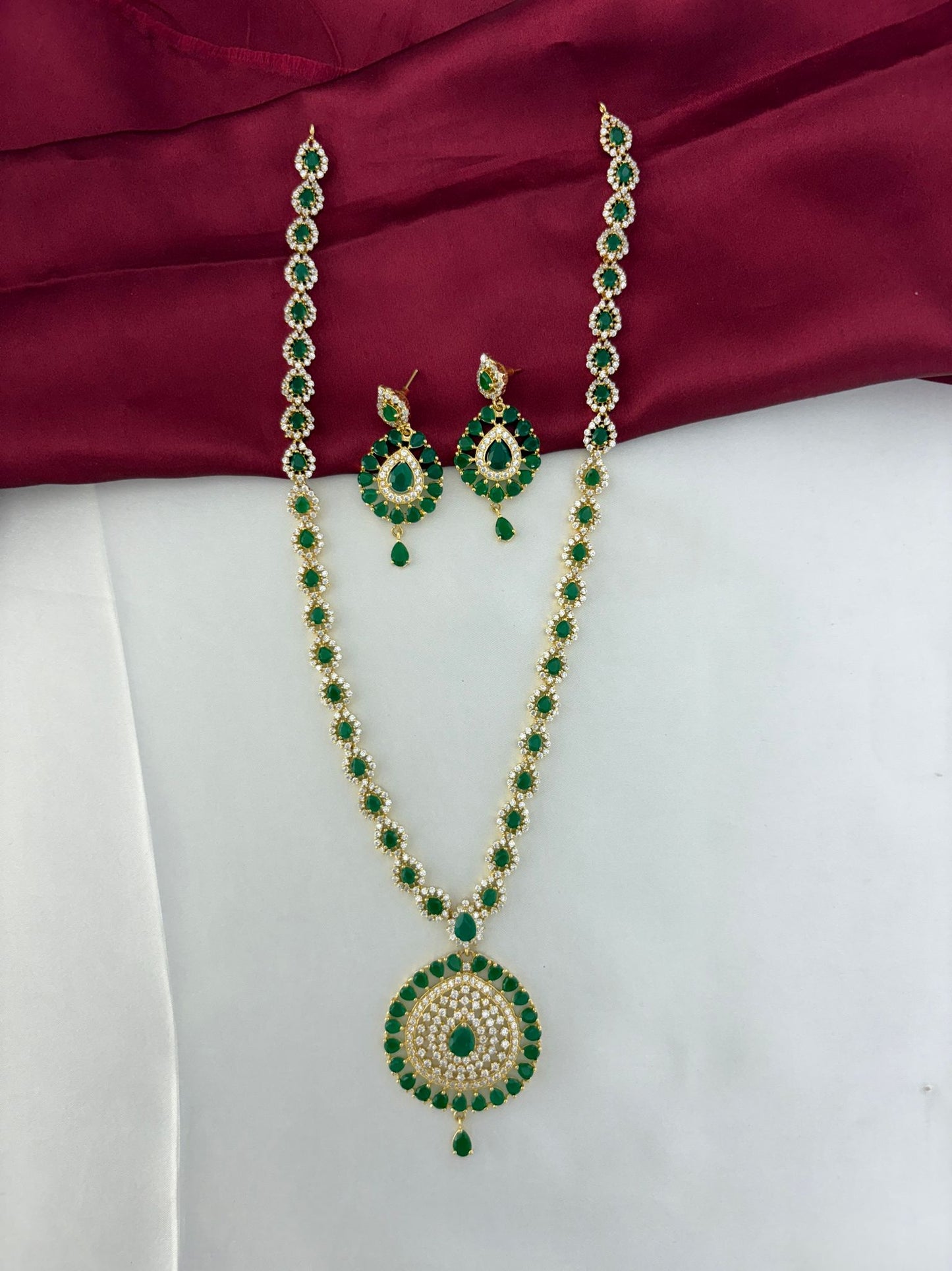 FeelOri Verdant Glade Emerald & AD Marquise Long Necklace and Earring Set - Complete set flatlay view.