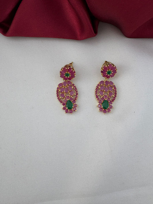 Close-up of FeelOri Vibrant Fusion Ruby & Emerald earrings from the Modern Ethnic short necklace set.