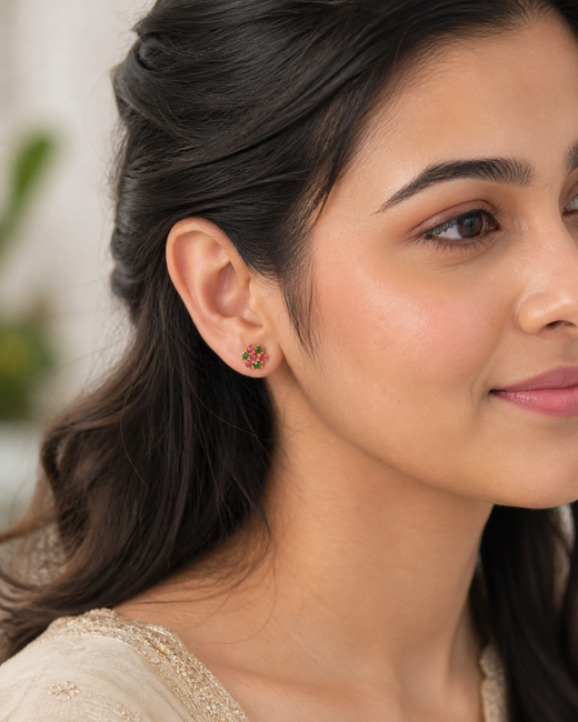 Model wearing FeelOri Watermelon Splash green and pink AD stud earrings for everyday ethnic styling