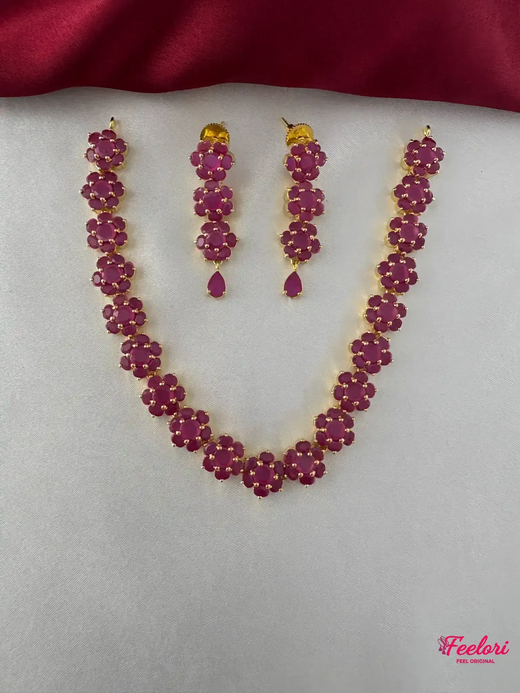 FeelOri Gold Plated Ruby Marquis Blossom Cascade Necklace Set - Full view showcasing the necklace and matching drop earrings on a white background.