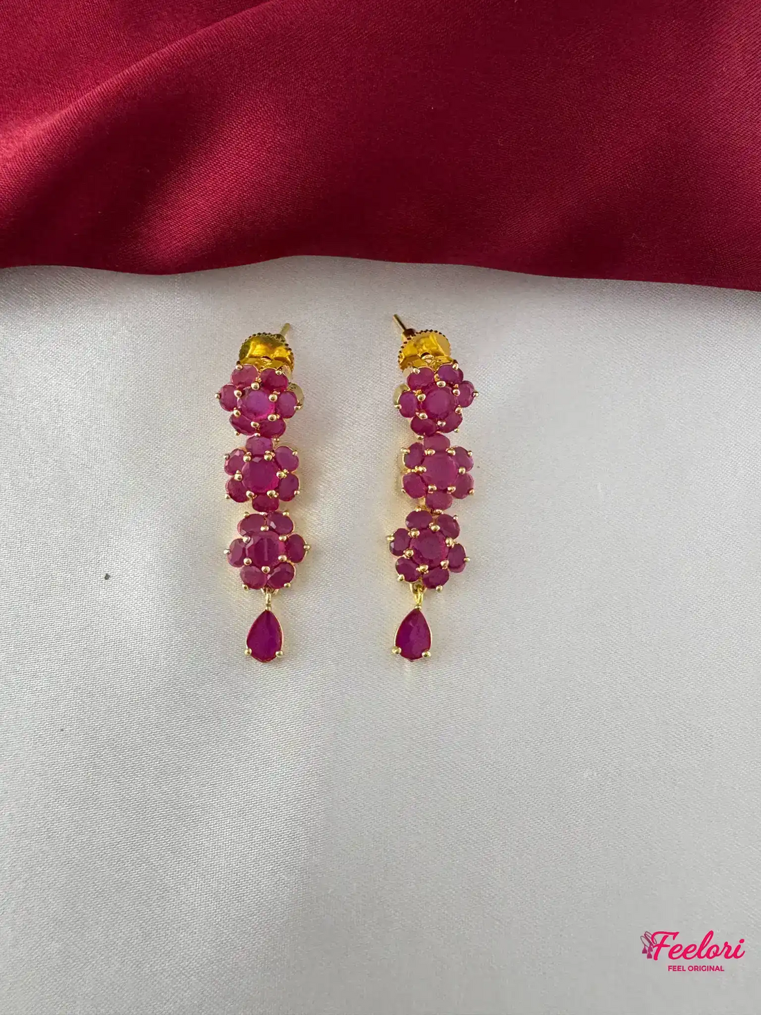 FeelOri Gold Plated Ruby Marquis Blossom Cascade Earrings - Close-up view of the two Ruby-Tone CZ marquis cluster drop earrings with gold plating.