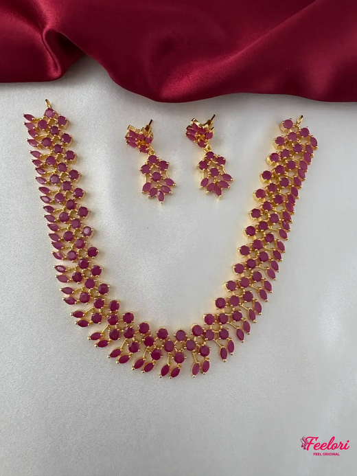 FeelOri Gold Plated Ruby Marquis Blossom Necklace Set - Front view showcasing the full necklace with its unique marquis-cut stone arrangement and matching earrings.