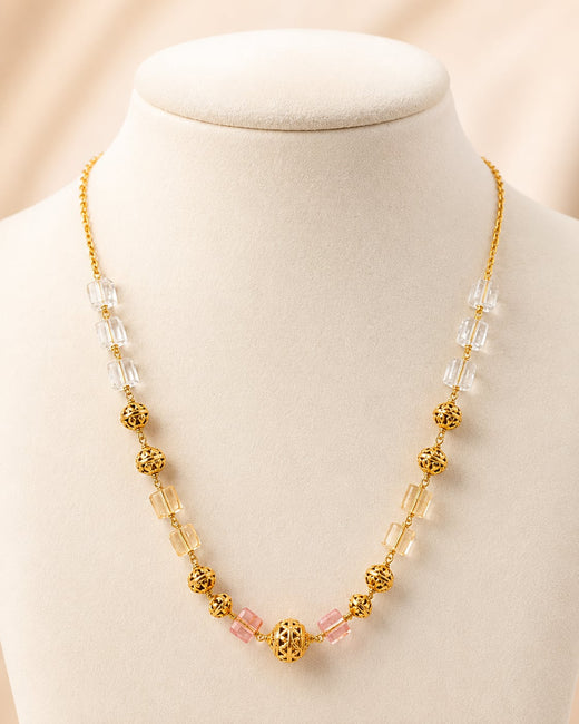FeelOri gold-polished necklace on jewellery display