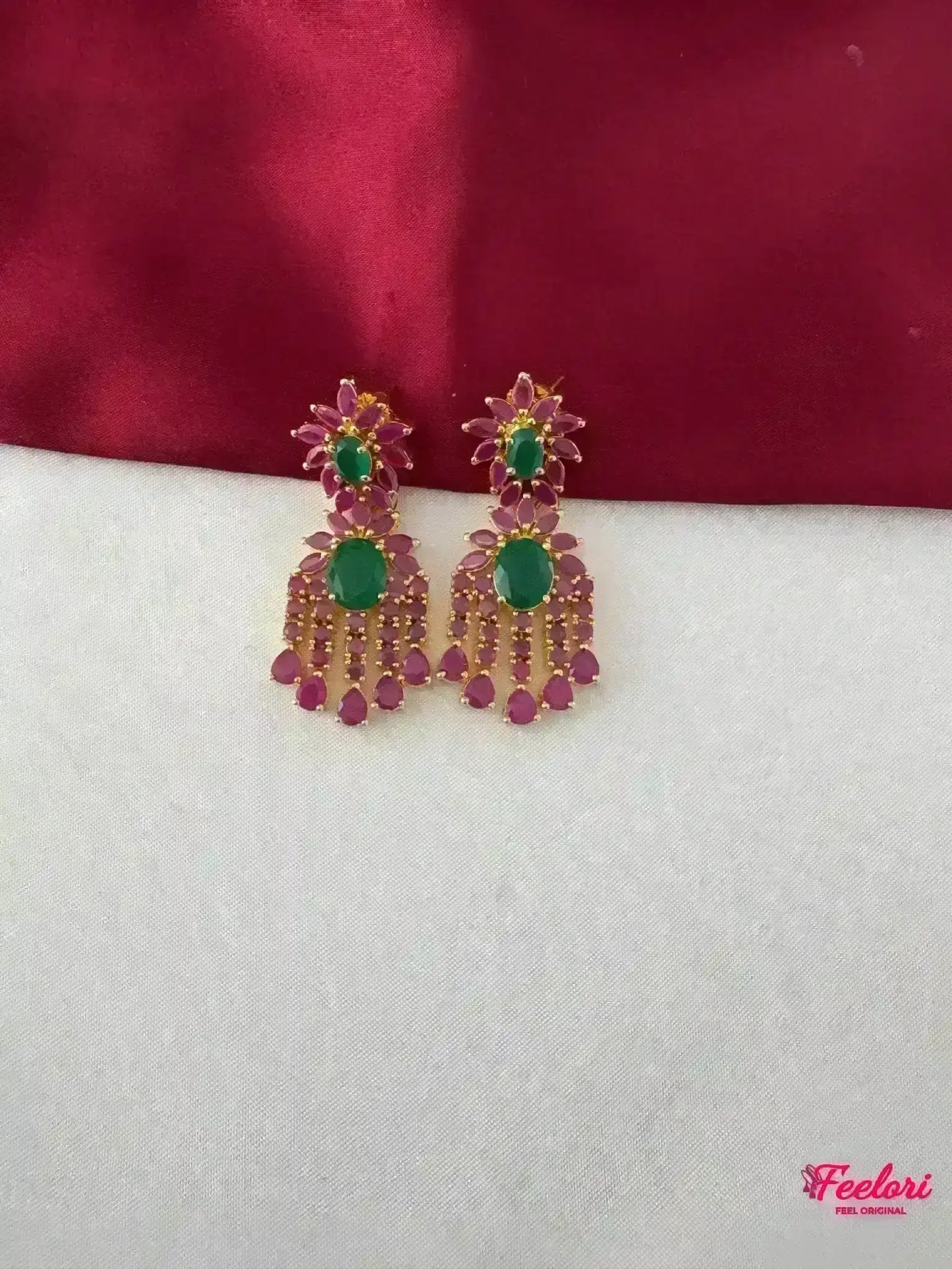 FeelOri Gold Plated Ruby Emerald Petal Drop Earrings - Close-up view highlighting the genuine ruby and emerald stones and delicate gold plating.