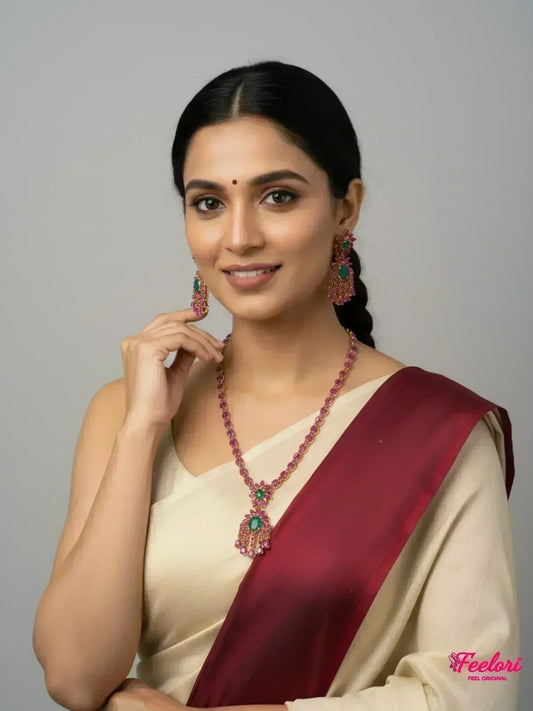 FeelOri Gold Plated Ruby Emerald Petal Drop Necklace Set - Model in traditional saree, elegantly displaying jewelry