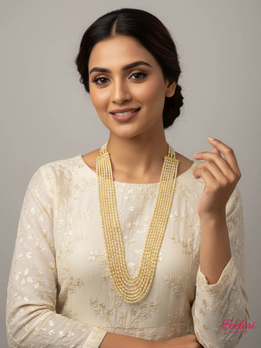FeelOri Gold Plated Seven-Strand Necklace - Model wearing graded Mother of Pearls design in traditional outfit