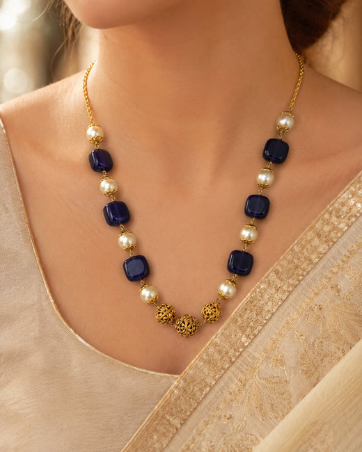 FeelOri gold-polished necklace styled with Indian occasion wear