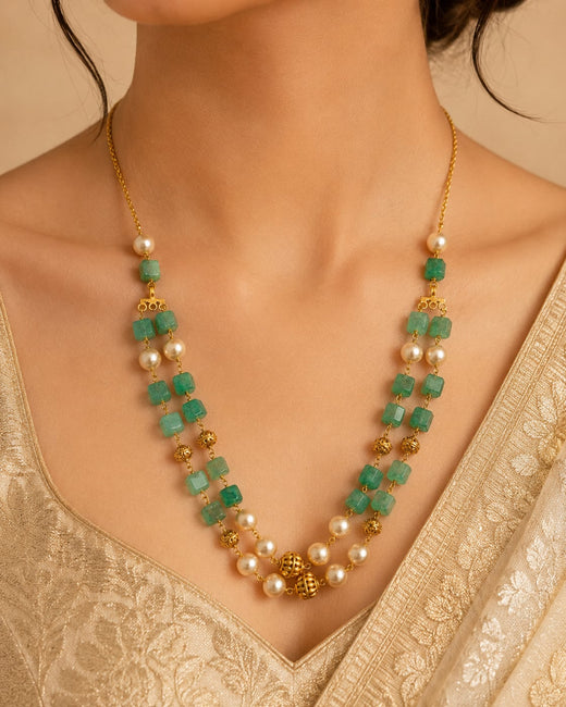 FeelOri gold-polished necklace styled with Indian occasion wear