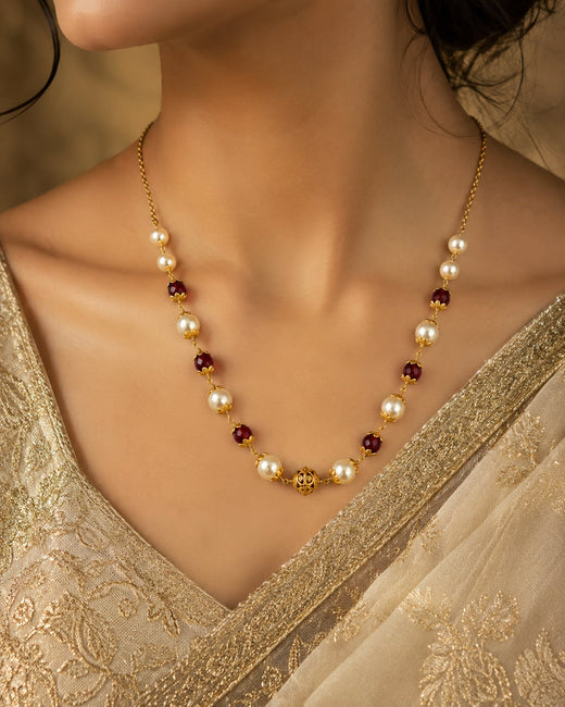 FeelOri gold-polished necklace styled with Indian occasion wear